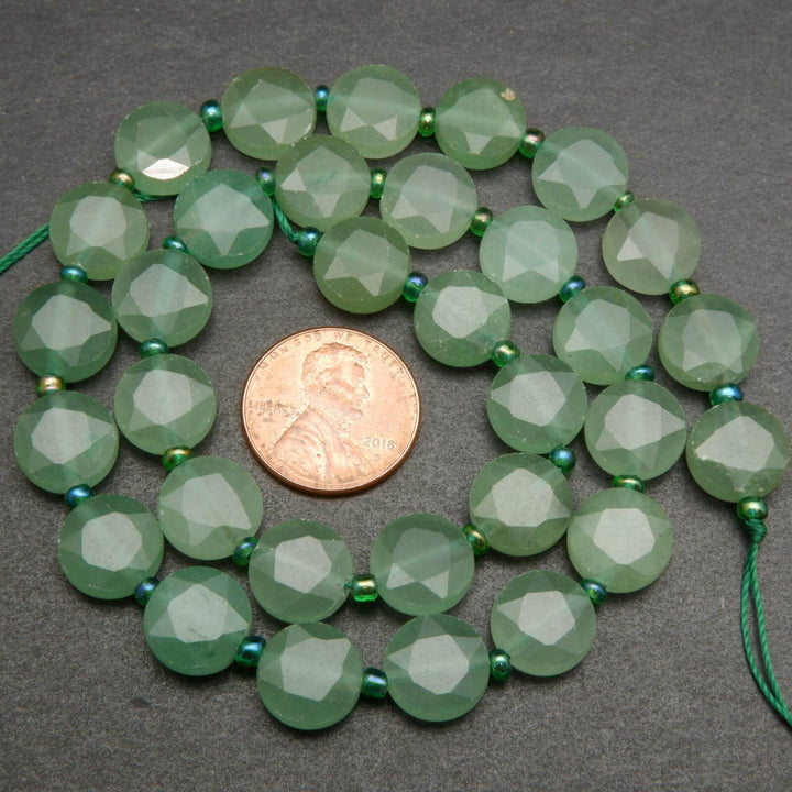 Green aventurine coin shape beads.
