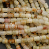 Natural calcite gemstone beads featuring layered patterns of green, ivory, and warm brown