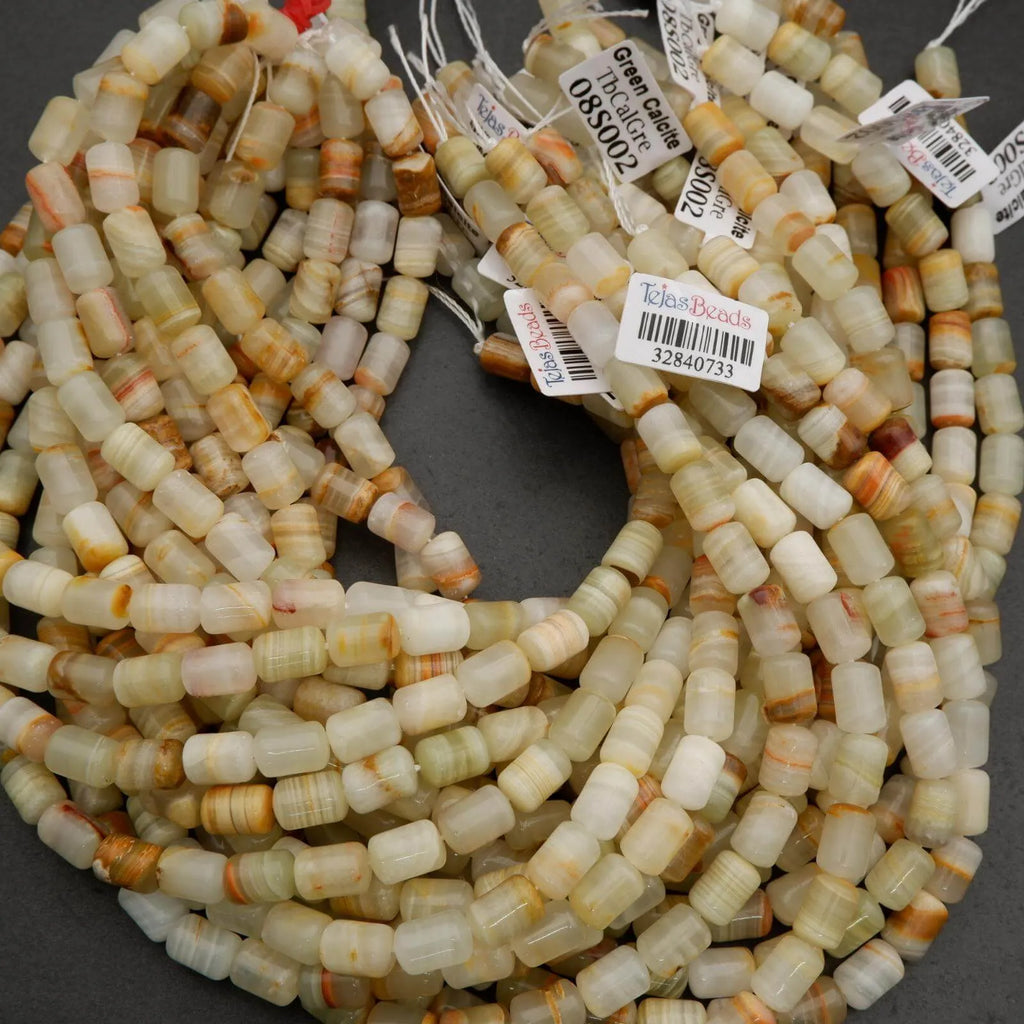 Striped calcite beads in pale green, beige, and golden tones for jewelry making