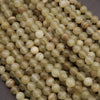 Close-up of beige beads on a dark background