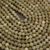 Close-up of light green beads