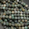 Matte finish green jade beads.