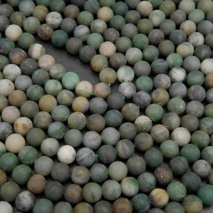 Matte finish green jade beads.