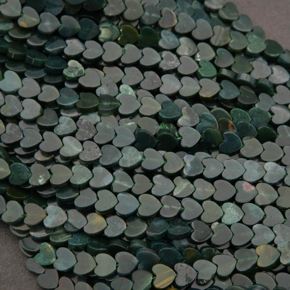 Close-up of green heart-shaped beads.