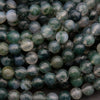 Close-up of green and white marbled beads