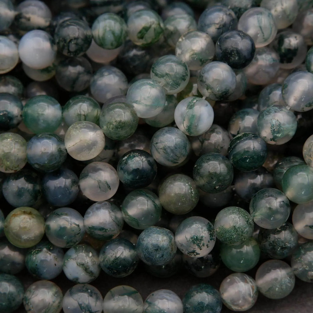 Close-up of green and white marbled beads