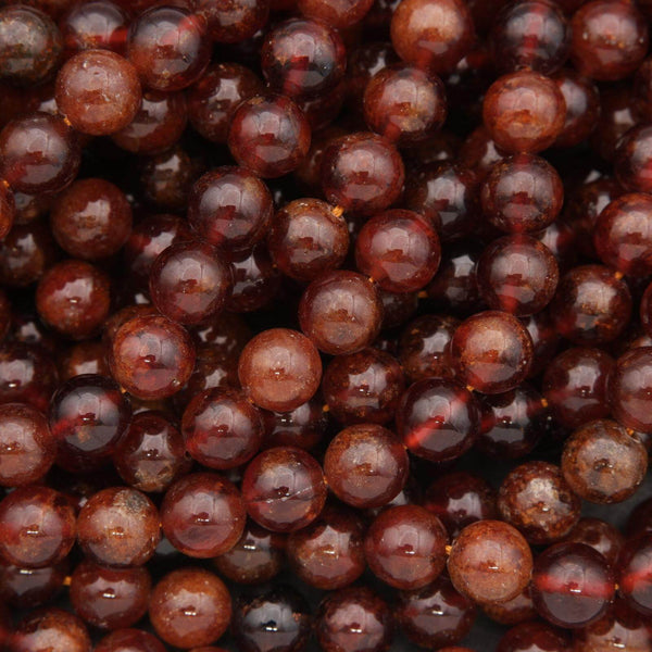 Close-up of dark red beads