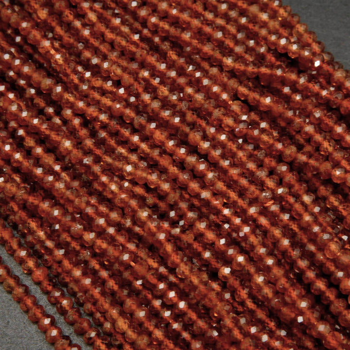 Orange hessonite garnet beads.