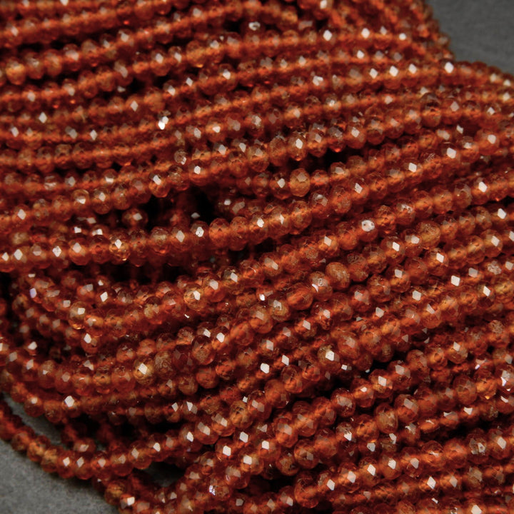 Orange hessonite garnet beads.