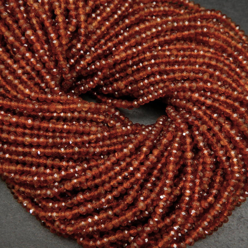 Orange hessonite garnet beads.