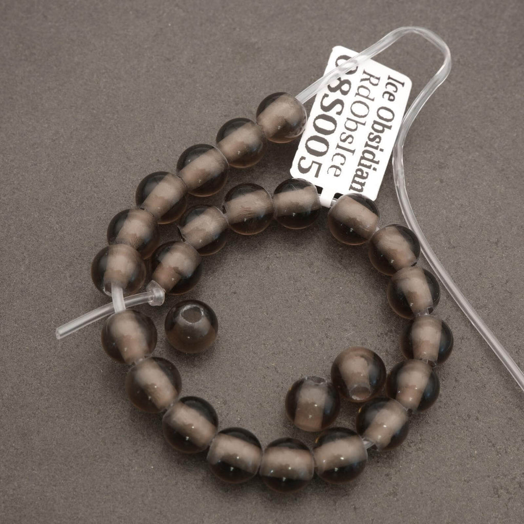 Beaded bracelet with a label on a gray background