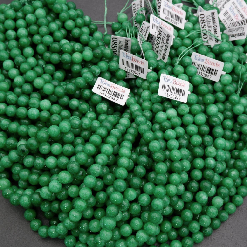 Green beads with barcodes on a gray background