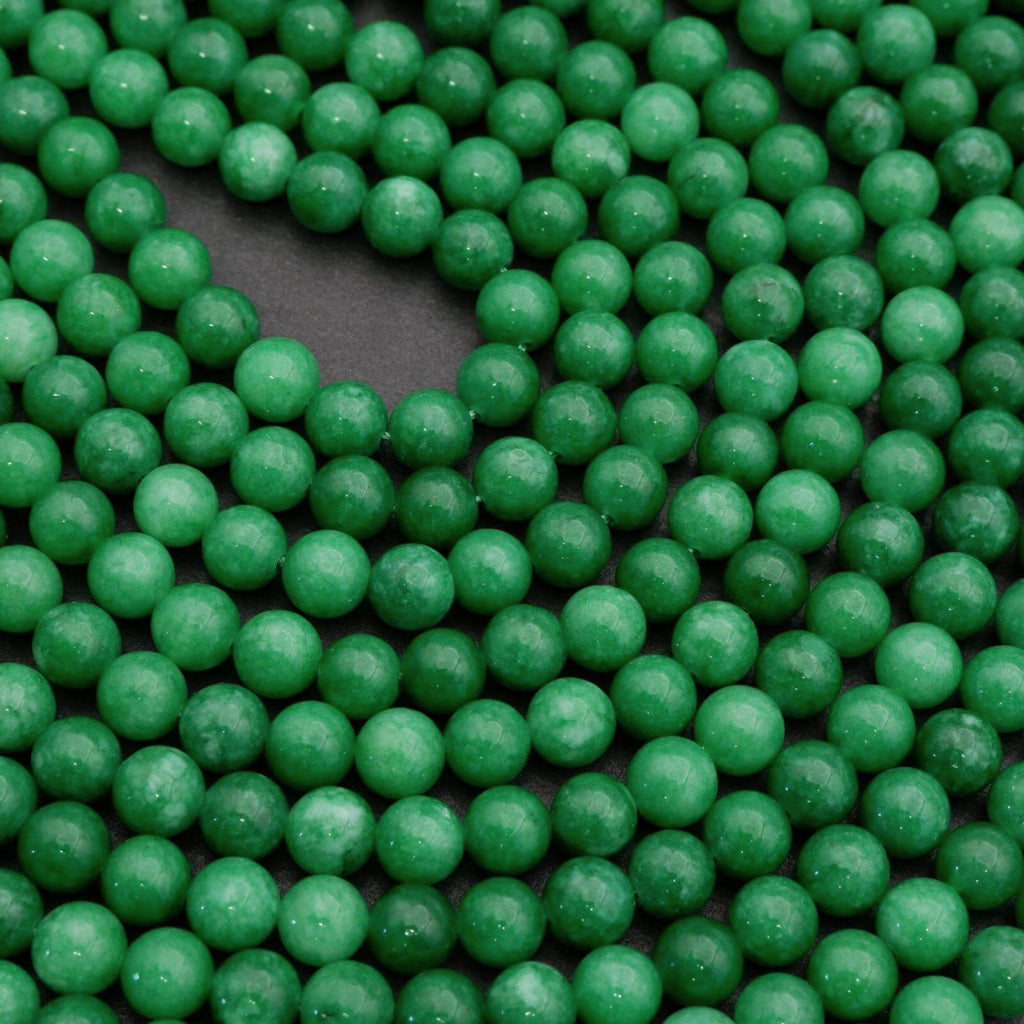 Close-up of green beads on a black background