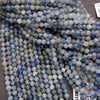 Faceted kyanite beads featuring soft color variation and natural fibrous texture.