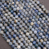 Light blue and gray kyanite faceted beads with natural inclusions and subtle shimmer.