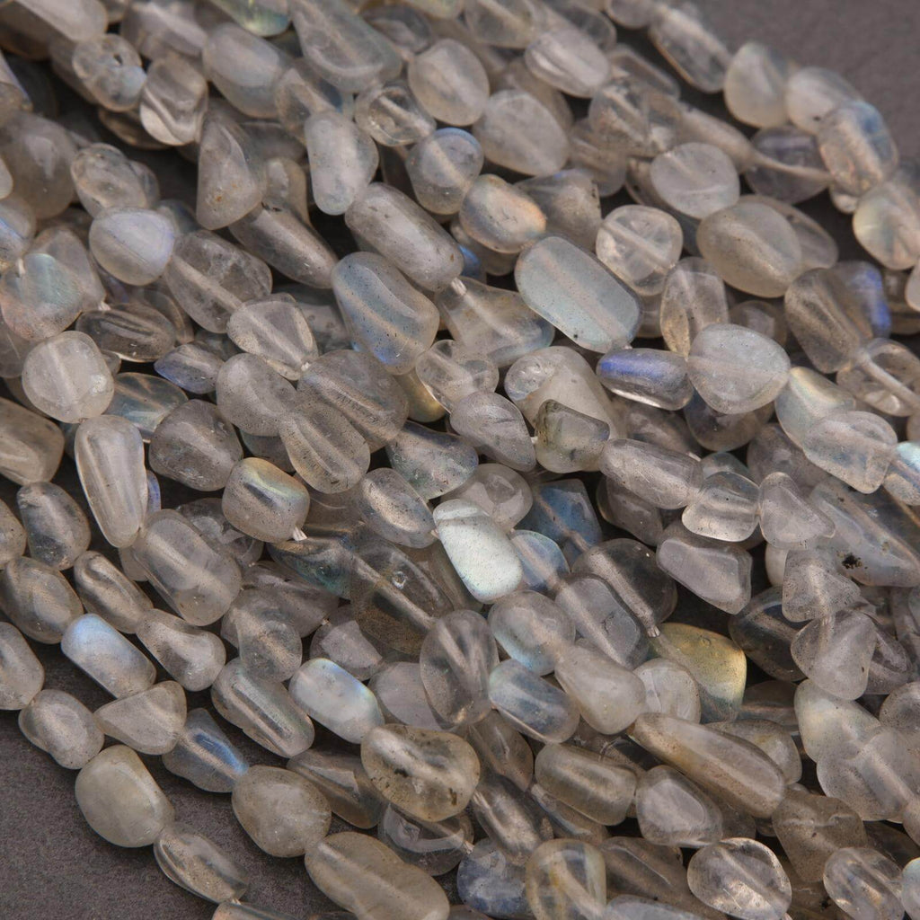 Close-up of translucent beads on a dark surface