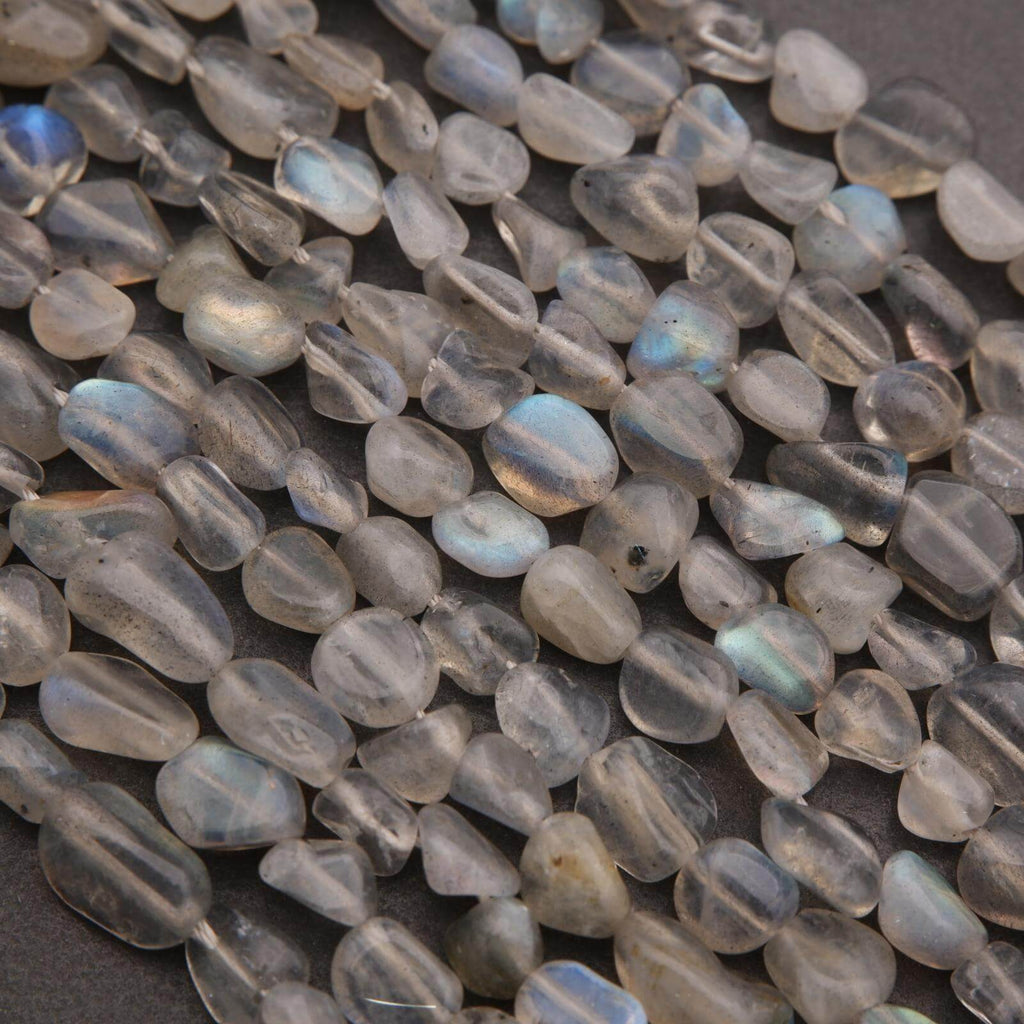 Close-up of translucent blue beads on a dark background