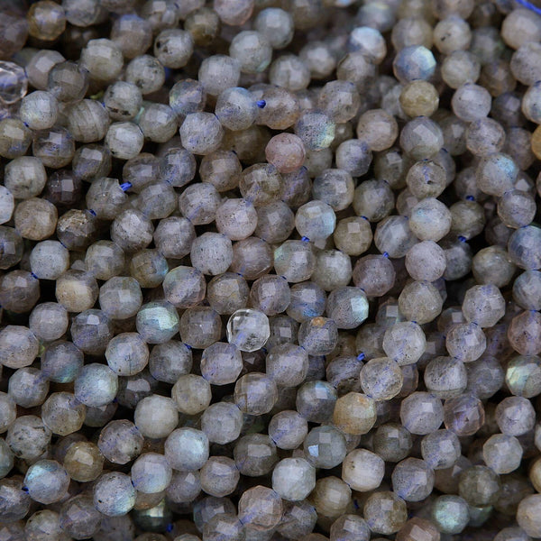 Close-up of small, faceted gemstones with a metallic sheen.