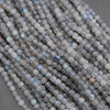 Close-up of a string of gray beads on a gray background
