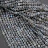 Close-up of light blue beads on a gray background
