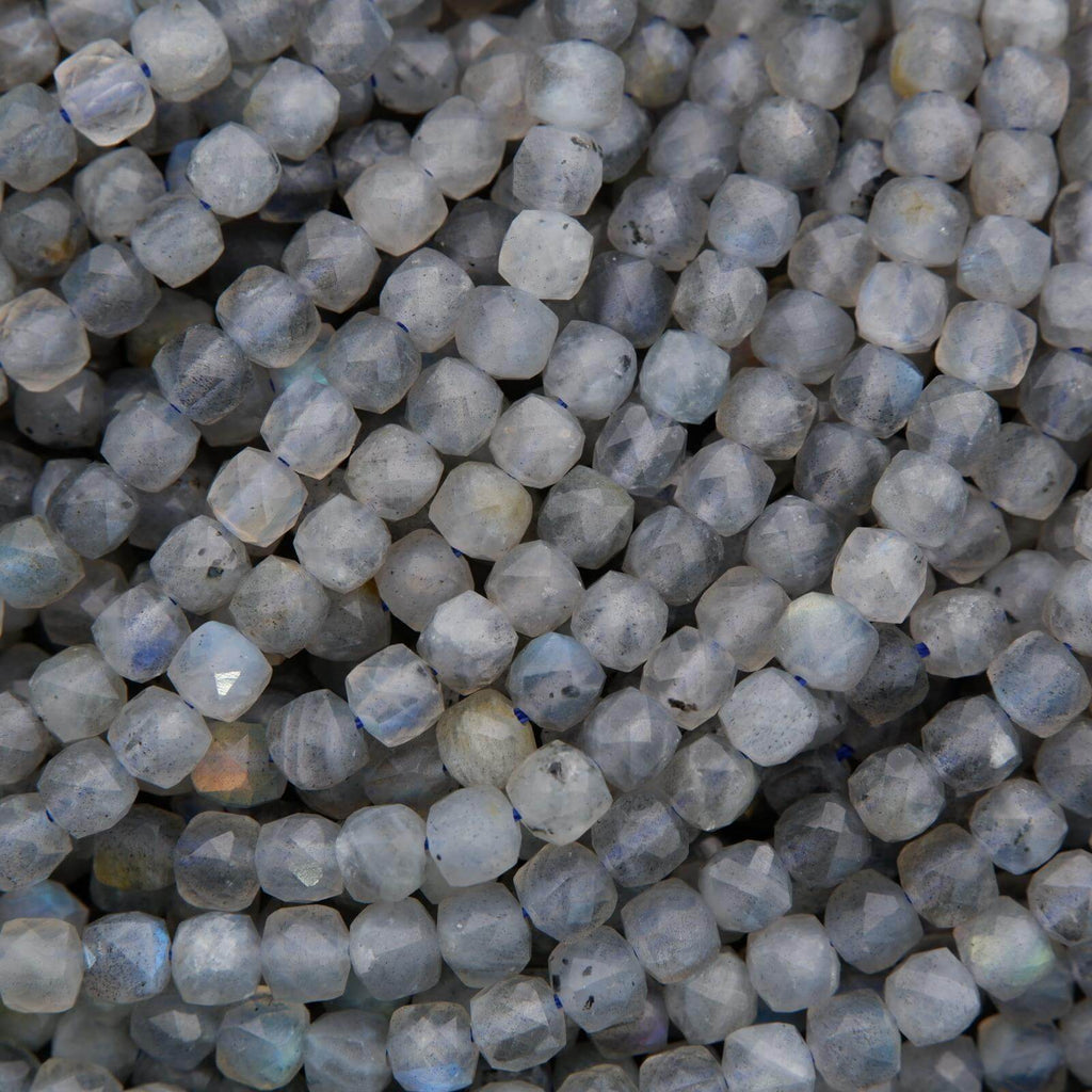 Close-up of gray beads with a textured surface
