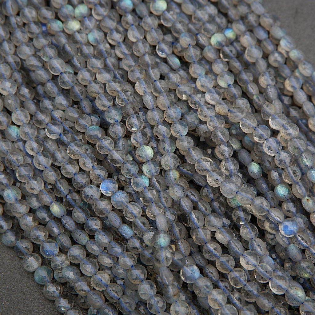 Close-up of transparent blue beads on a dark background