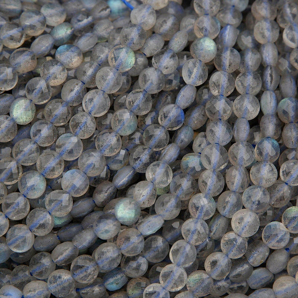 Close-up of translucent beads with blue and green reflections