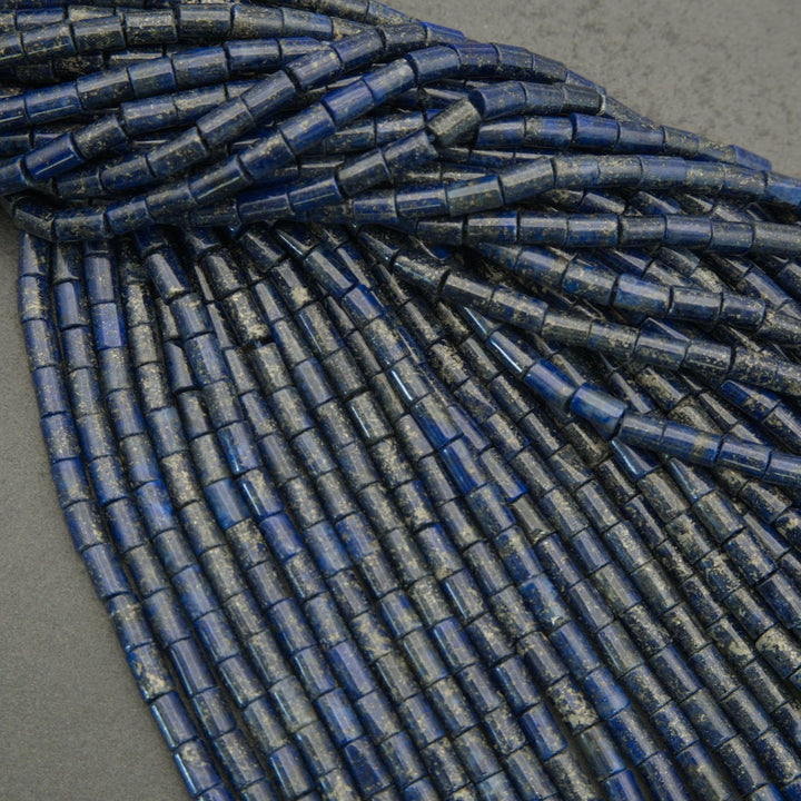 Polished lapis lazuli beads with gold flecks
