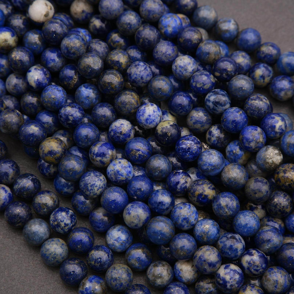 Close-up of blue beads on a dark background