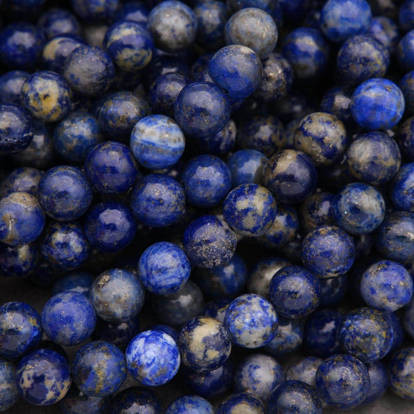 Close-up of blue beads with white speckles