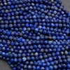 Close-up of blue beads on a gray background
