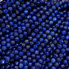 Close-up of blue beads with a blue background