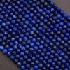 Close-up of blue beads on a dark background