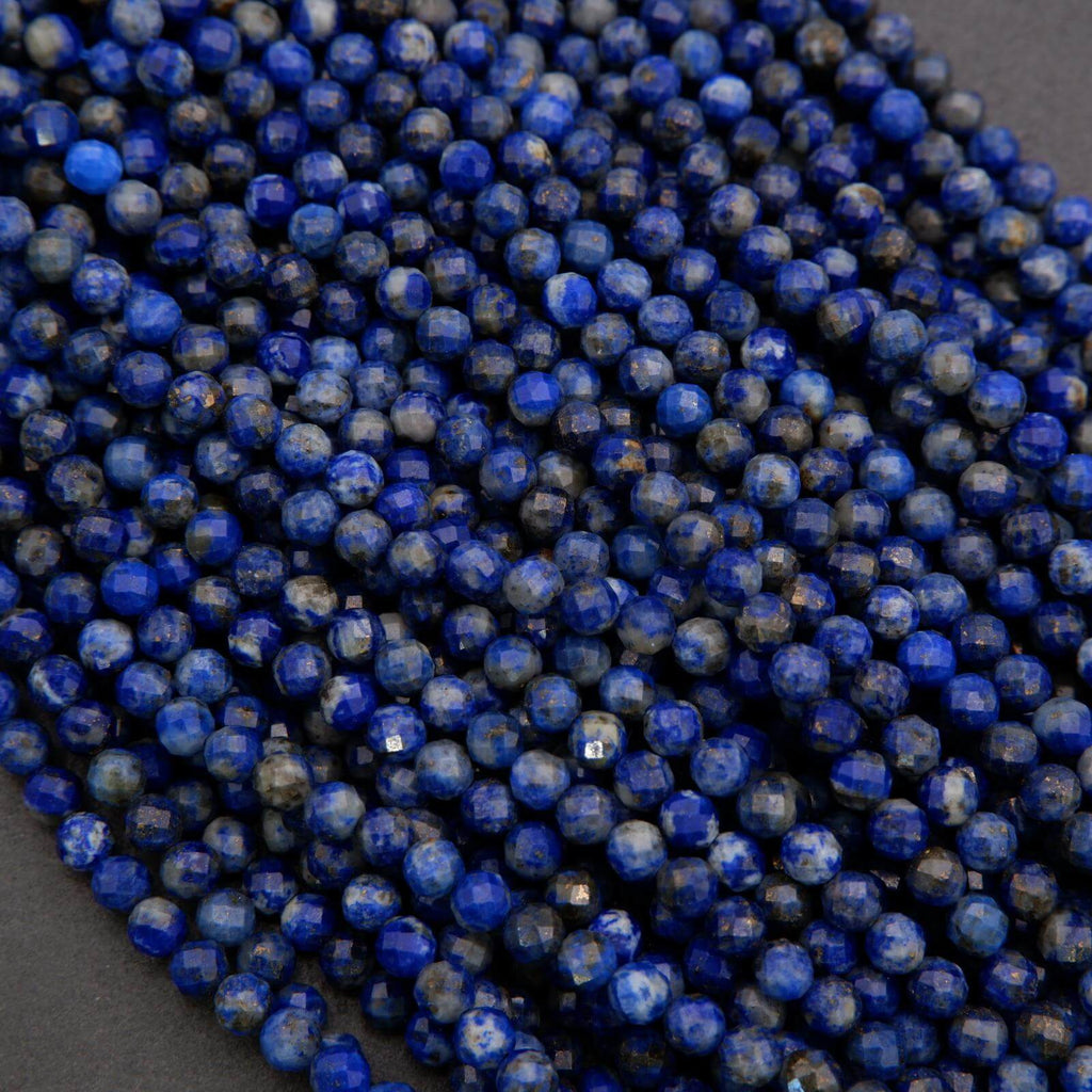 Close-up of blue beads on a dark background
