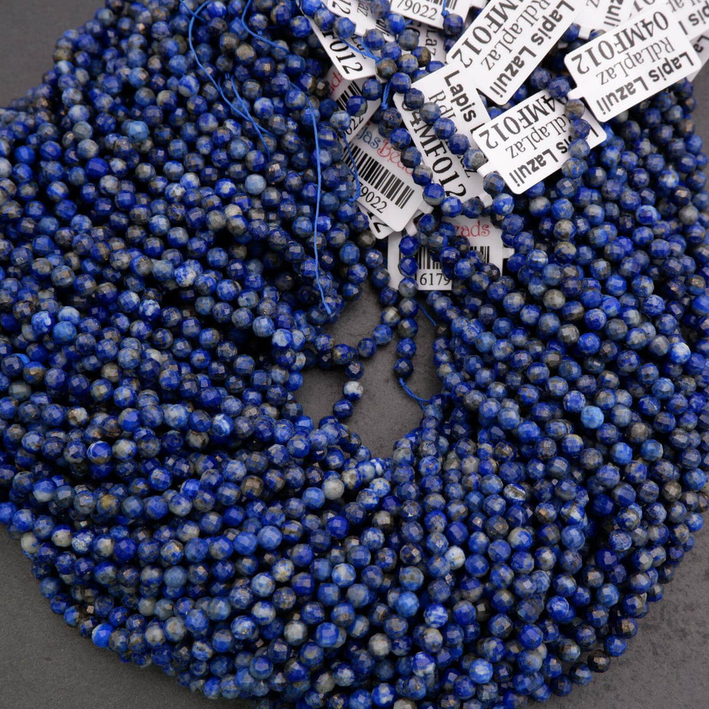 Blue beads with price tags on a gray background