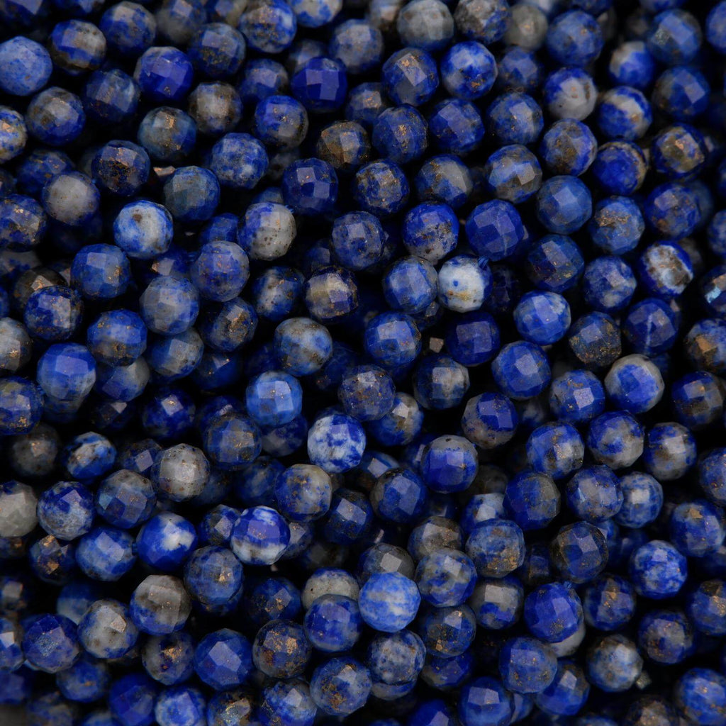 Close-up of blue beads with a dark background