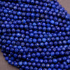 Close-up of blue beads on a gray background
