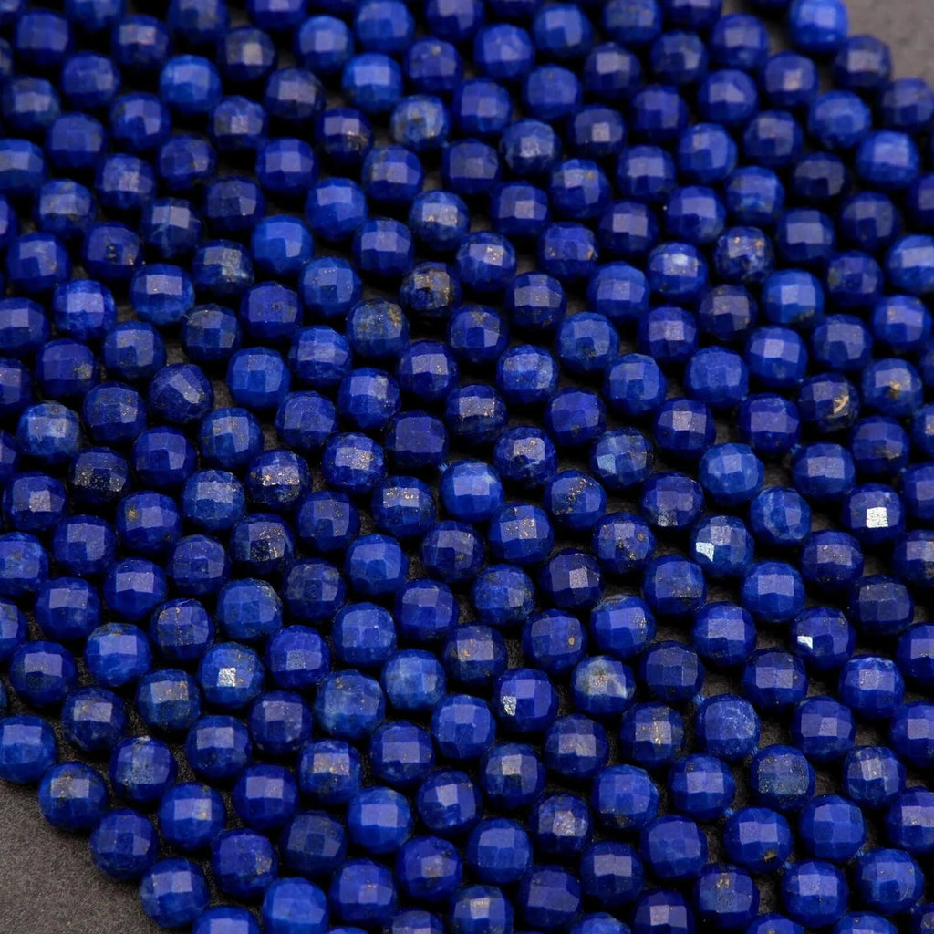Close-up of blue beads on a dark background