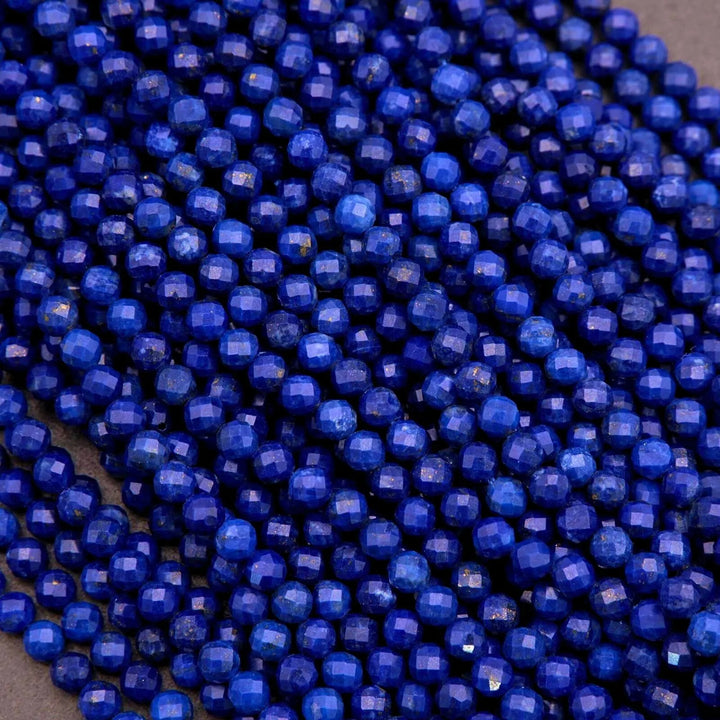 Close-up of blue beads on a dark background
