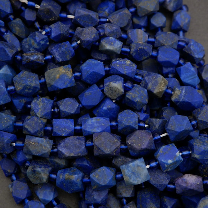 Close-up of blue faceted beads on a gray background