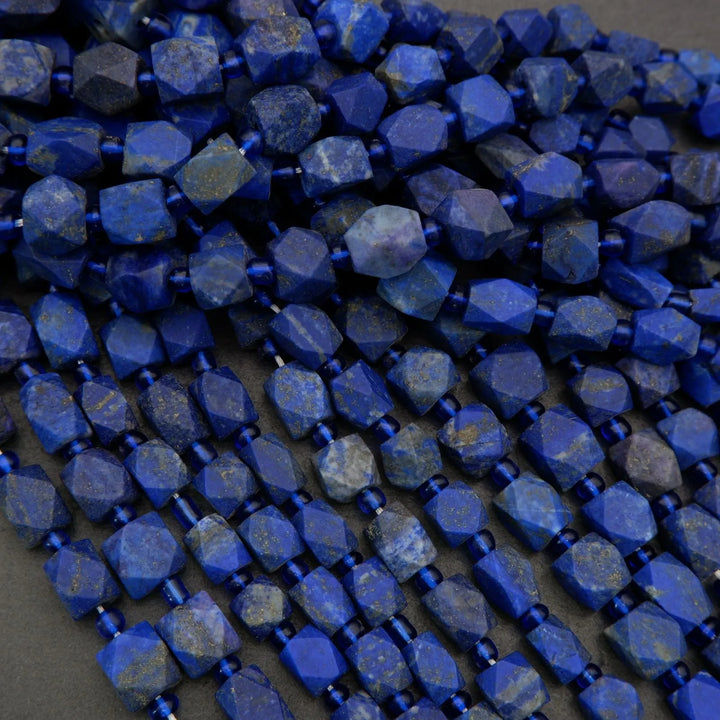 Close-up of blue faceted beads on a dark background