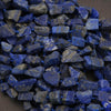 Close-up of blue stone chips on a dark background