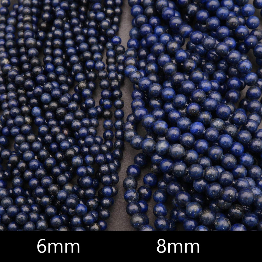 Detailed view of lapis lazuli gemstone beads arranged side by side.