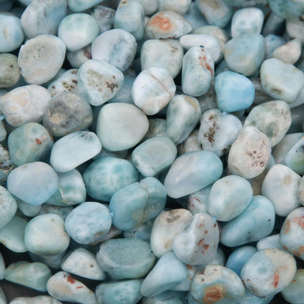 Close-up of turquoise stones with various shades and textures.