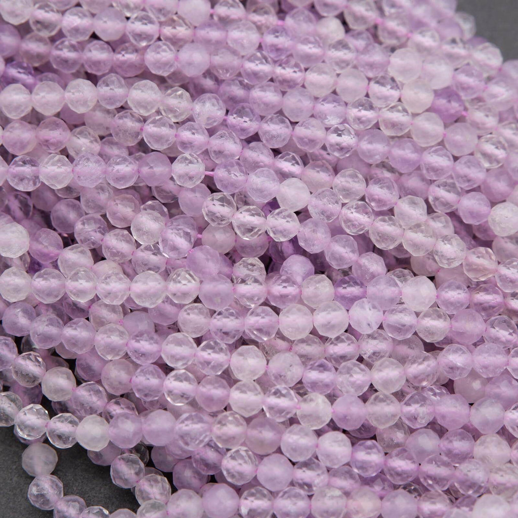 Close-up of purple beads on a gray background