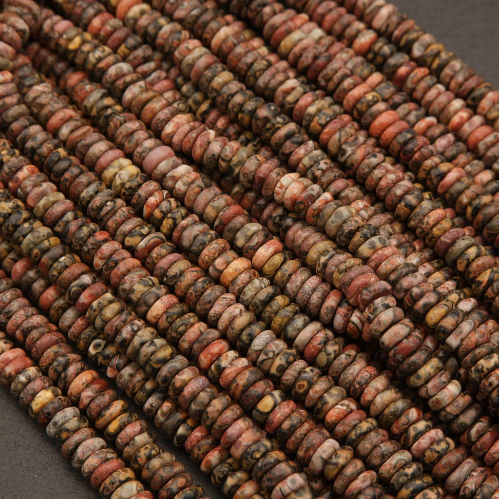 Close-up of a string of multicolored beads on a dark background