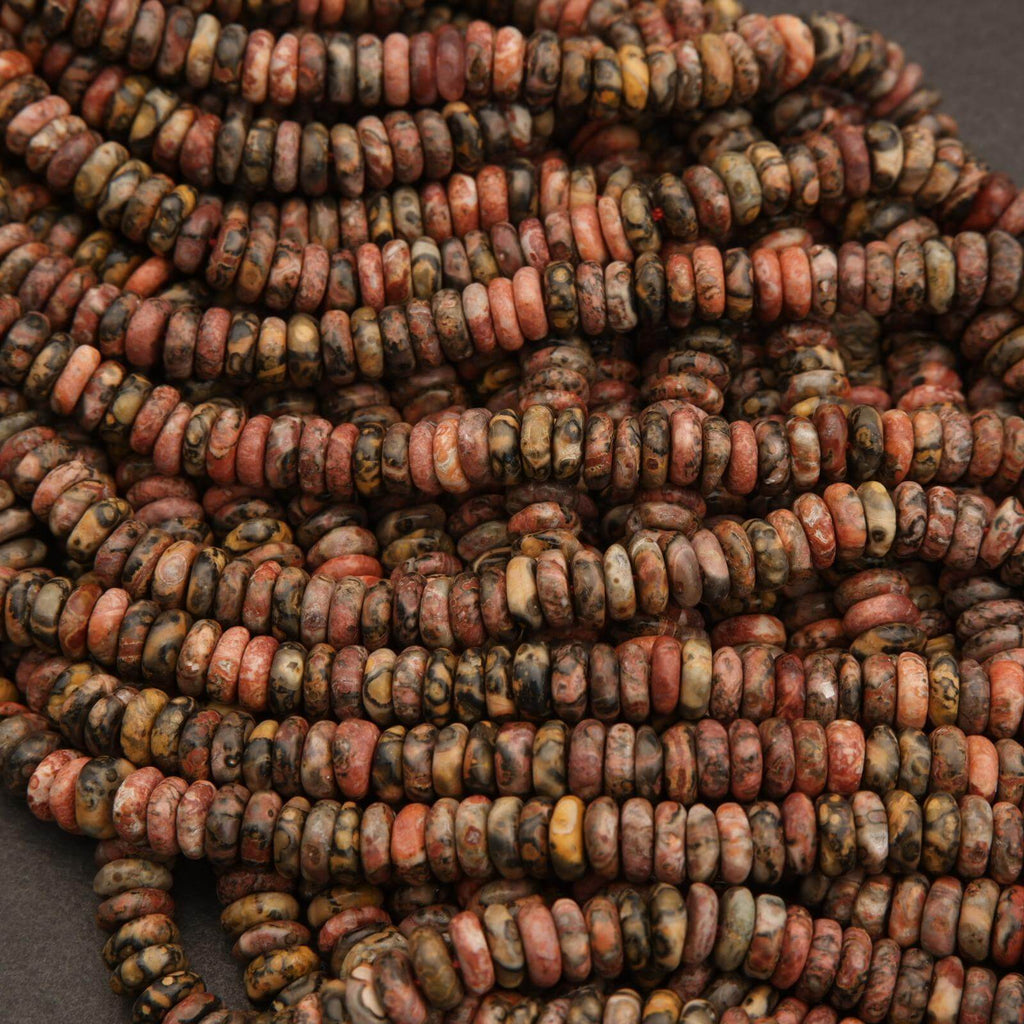 Close-up of a string of multicolored beads on a dark background