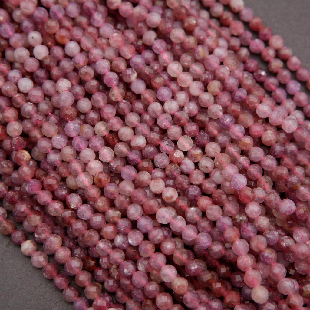 Purple and pink round faceted beads.