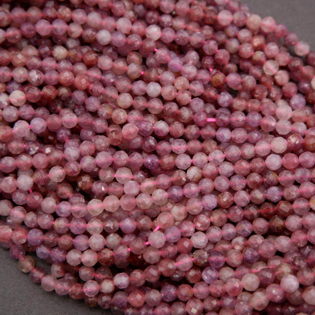Purple and pink round faceted beads.