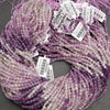 Purple and white beaded string with labels on a gray background